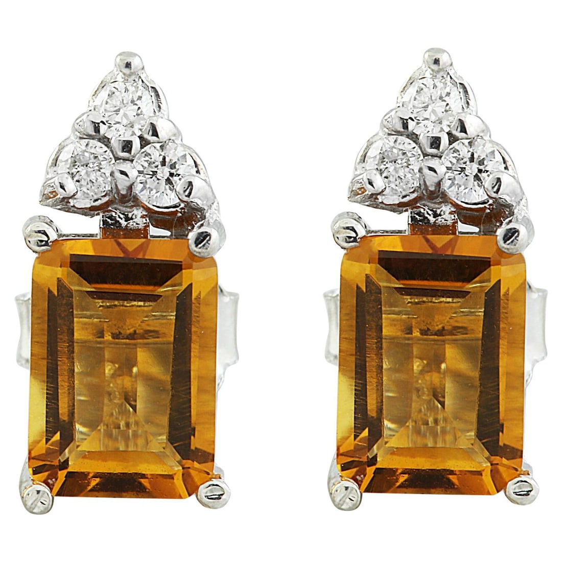 Citrine Diamond Earrings 14K White Gold: Natural Citrine Diamond Earrings 14K White Gold Metal: 14k Gold, White Gold Stone: Citrine, Diamond Stone Cut: Emerald Cut Place of Origin: United States Period: 2010- Date of Manufacture: 2023 Condit
