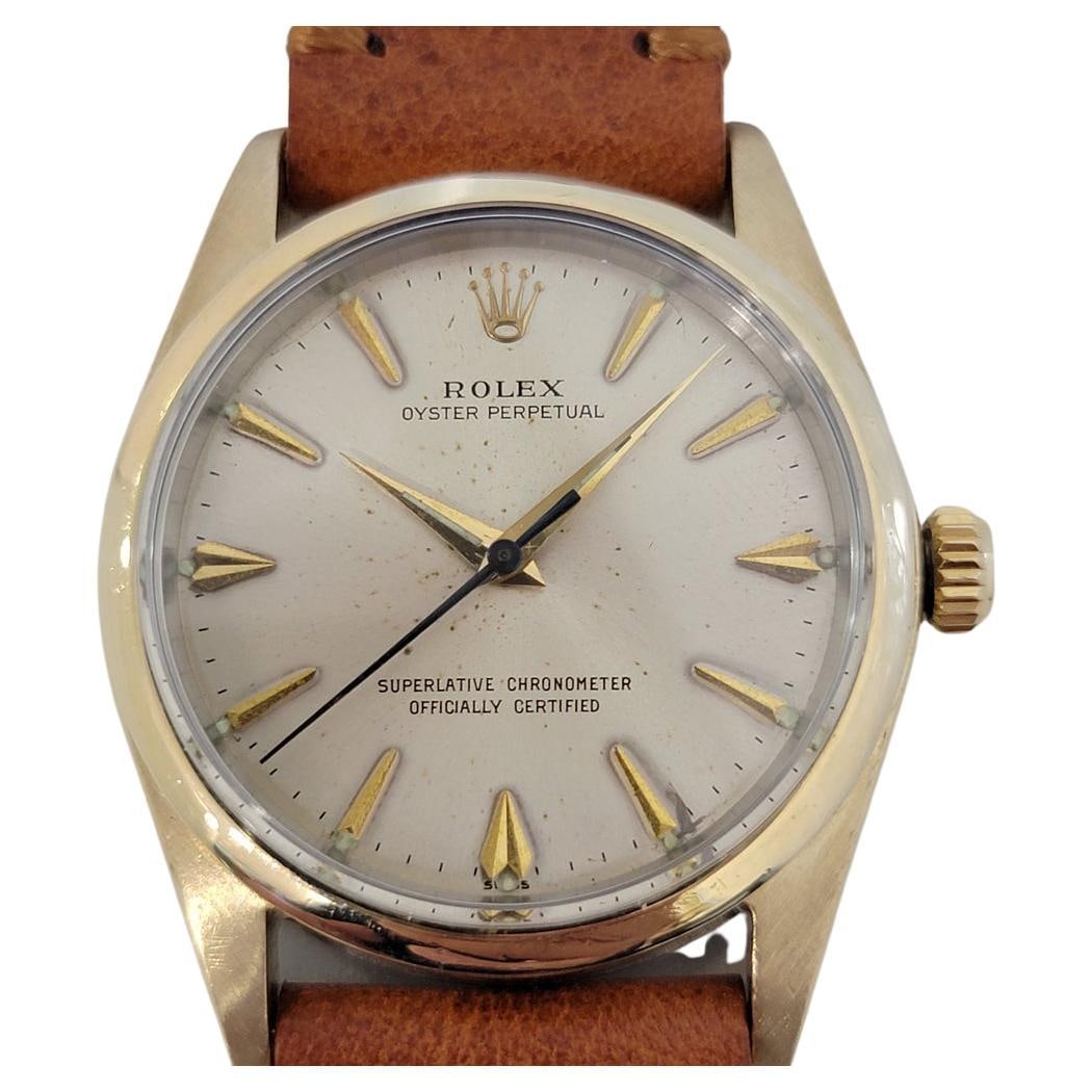 Mens Rolex Oyster Perpetual 1014 Automatic Gold Capped 1960s w Paper RA236T: Mens Rolex Oyster Perpetual 1014 Automatic Gold Capped 1960s w Paper RA236T Brand: Rolex Movement: Automatic Case Dimensions: Width: 1.34 in (34 mm) Place of Origin: Switzerland Period: 1960-1969