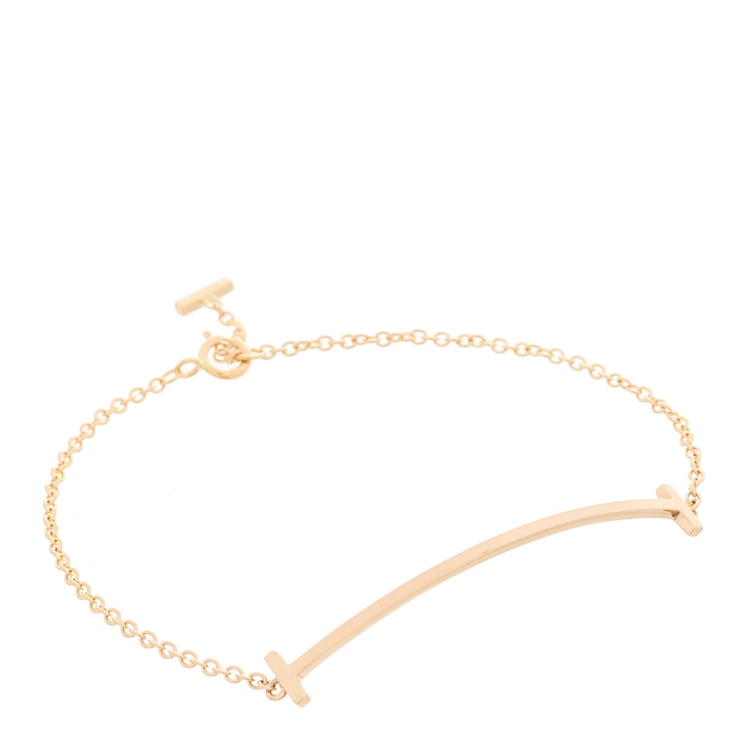 Tiffany 18K Rose Gold T Smile: Tiffany 18K Rose Gold T Smile Bracelet Brand: TIFFANY Condition: Excellent Condition Details: Hardware: Faint scratch(es), , Pouch, Due to grading limitations imposed by mounted stones, all grading of