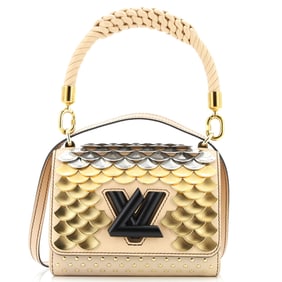 Louis Vuitton Braided Handle Twist Bag