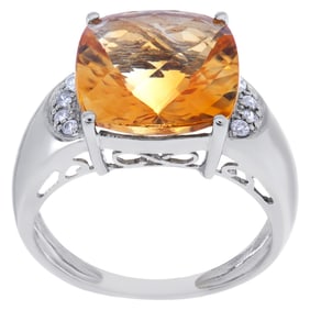 Orange topaz and diamond ring in