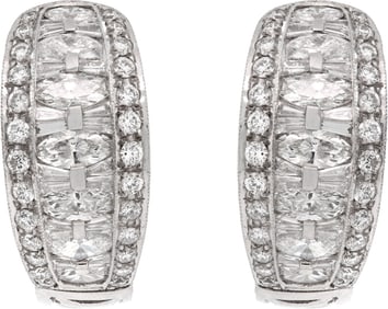 Magnificent huggie diamond earrings in platinum