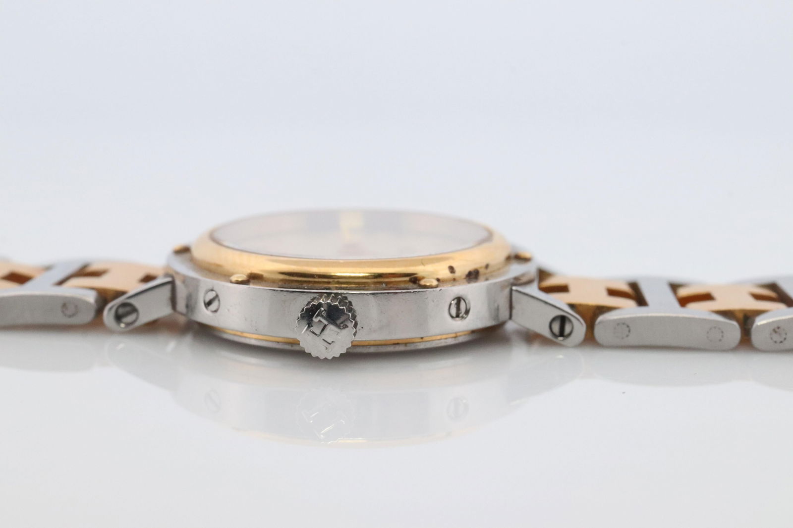 Genuine HERMES Stainless Steel 24mm Round: Genuine HERMES Stainless Steel 24mm Round Clipper Quartz Watch Champagne Dial. This is an authentic HERMES Stainless Steel Watch ref CL4.220 24mm Round Clipper Quartz Champagne Dial. The watch is