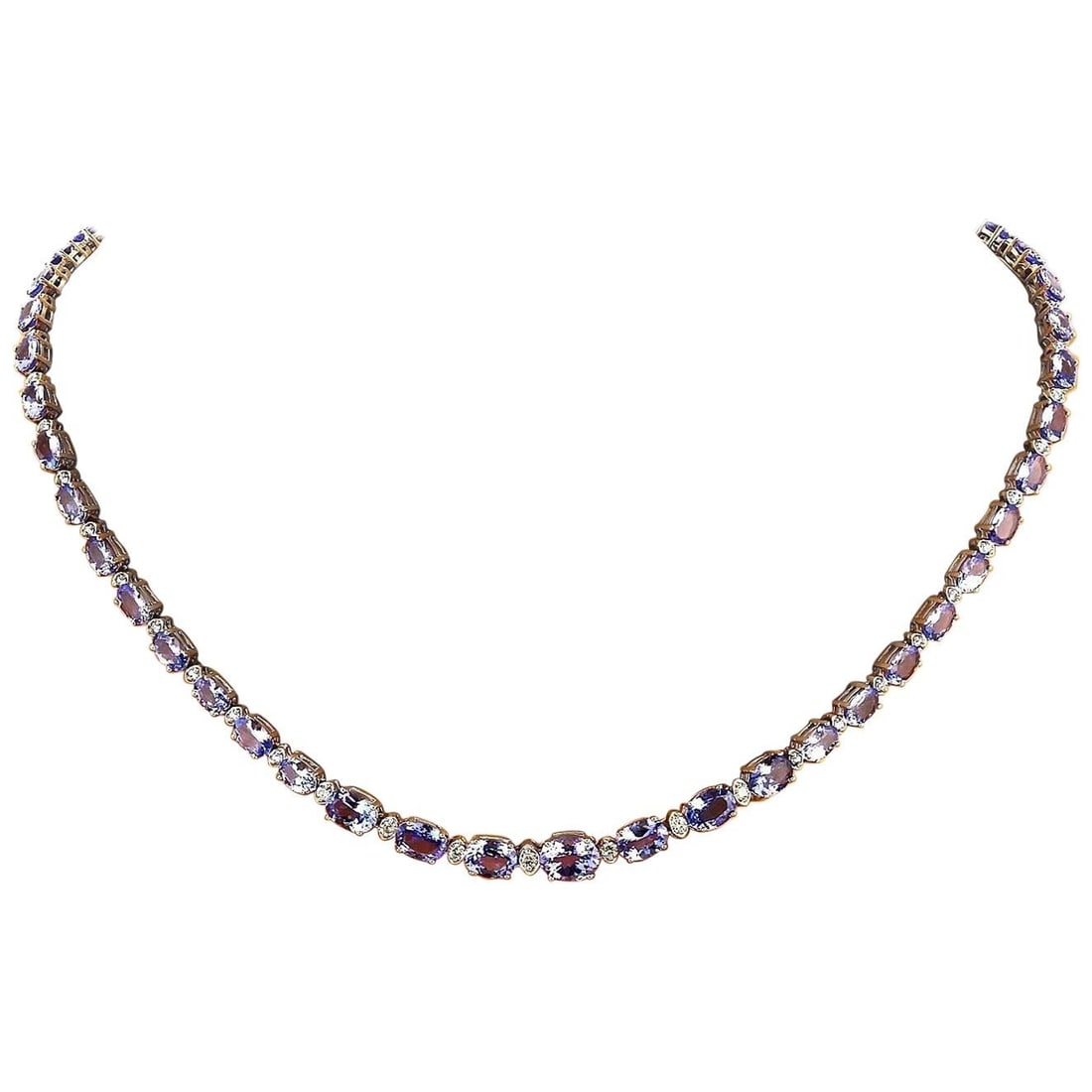34.50 CTW Tanzanite 18K White Gold Diamond Necklace: 34.50 CTW Tanzanite 18K White Gold Diamond Necklace Place of Origin: United States Period: 2010- Date of Manufacture: 2019 Condition: New 34.50 CTW Tanzanite 18K Solid White Gold Diamond Necklace Item