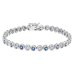 Bezel set blue sapphire and diamond