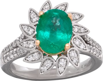 Emerald and diamond ring set in