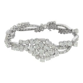 Round and baguette diamond bracelet in