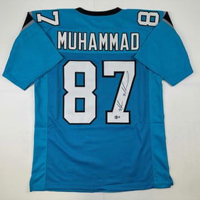 autographed/signed muhsin muhammad carolina blue football
