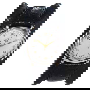Tudor Watch Company by Rolex Nickel: Tudor Watch Company by Rolex Nickel Cushion Shaped Watch circa 1940s Creator: Tudor Case Shape: Cushion Movement: Manual Wind Style: Art Deco Place of Origin: Switzerland Period: 1940-1949 <br