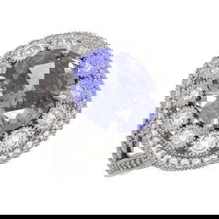 6.96 ctw Certified Tanzanite & Diamond Victorian Ring 14K White Gold: 6.96 ctw Certified Tanzanite & Diamond Victorian Ring 14K White Gold Item: Tanzanite RingTotal Gem weight: 6.96 carats Metal: Solid 14K White Gold Gold Product Weight: Approx. 8.2 grams Jewelry