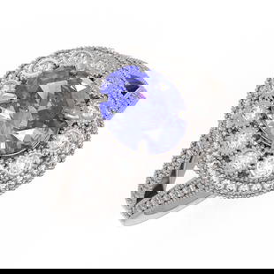 4.76 ctw Certified Tanzanite & Diamond Victorian Ring 14K White Gold: 4.76 ctw Certified Tanzanite & Diamond Victorian Ring 14K White Gold Item: Tanzanite RingTotal Gem weight: 4.76 carats Metal: Solid 14K White Gold Gold Product Weight: Approx. 6.8 grams Jewelry