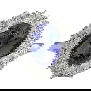 Natural Tanzanite Diamond Ring In 18K White Gold: Natural Tanzanite Diamond Ring In 18K White Gold Stamped: 18K White Gold Total Ring Weight: 6.0 Grams Total Natural Tanzanite Weight is 3.35 Carat (Measures: 10.00x8.00 mm) Color: Blue 