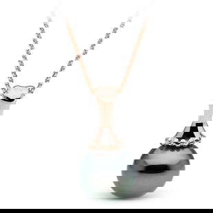 Black Tahitian Pearl Solitaire 'Weilele' Pendant: Black Tahitian Pearl Solitaire 'Weilele' Pendant Chain NOT included 12.0-13.0mm / 14K White Gold Guidelines for Bidding We recommend for all bidders to review the LiveAuctioneers bidding FAQ to