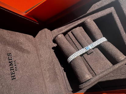 Hermes Faubourg Joaillerie watch white gold: Hermes Faubourg Joaillerie watch white gold and diamonds Creator: Hermes Case Material: 18k Gold, White Gold Stone: Diamond Stone Cut: Brilliant Cut Strap Material: White Gold Case Shape: Round <b