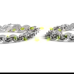 21.71 ctw Tourmaline & Diamond Micro Pave Halo Bracelet 10k White Gold: 21.71 ctw Tourmaline & Diamond Micro Pave Halo Bracelet 10k White Gold Item: Tourmaline BraceletTotal Gem weight: 21.7078048780488 carats Metal: Solid 10k White Gold Gold Product Weight: Approx.
