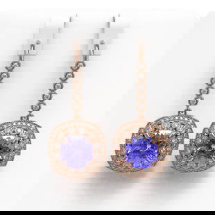 13.4 ctw Tanzanite & Diamond Victorian Earrings 14K Rose Gold: 13.4 ctw Tanzanite & Diamond Victorian Earrings 14K Rose Gold Item: Tanzanite EarringTotal Gem weight: 13.4 carats Metal: Solid 14K Rose Gold Gold Product Weight: Approx. 16.2 grams Jewelry Note