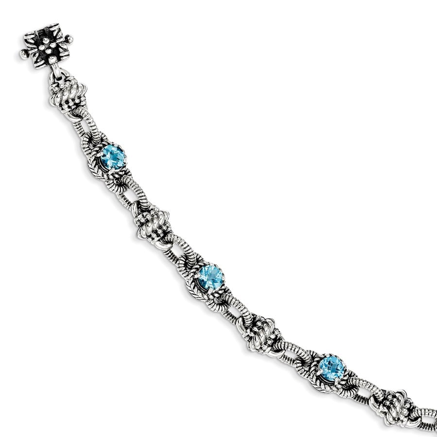 Sterling Silver Swiss Blue Topaz Bracelet: Sterling Silver Swiss Blue Topaz Bracelet SKU no: RBJ114506 Metal: Sterling Silver Purity: .925 Finish: Polished & Antiqued Chain Length: 7.75 in Chain Width: 10 mm Clasp/Connector: Box C