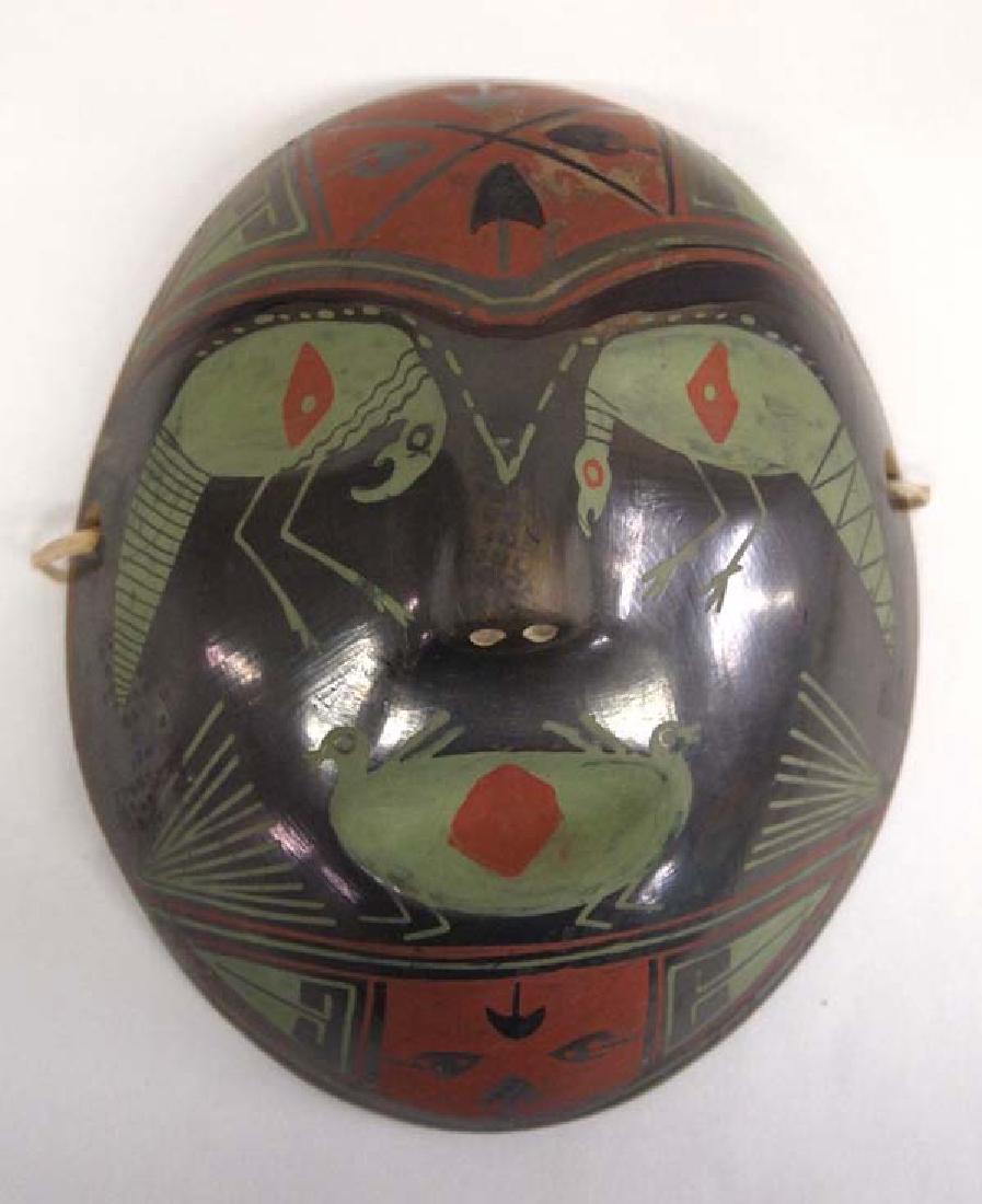 Mexican Mata Ortiz Pottery Mask by Felipe Andrew: Mexican Mata Ortiz Pottery Mask by Felipe Andrew, signed by artist and measures 7''L x 5.5'', some scuffing at top above eyes (see photo), ready to hang