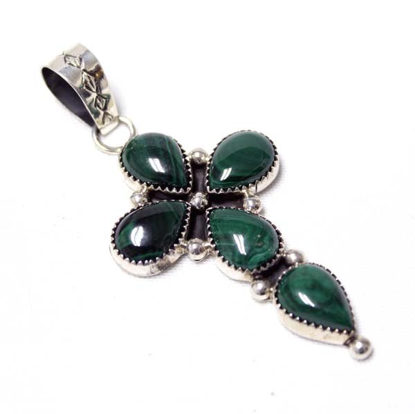 Navajo Sterling Malachite Cross Pendant: Native American Navajo Sterling Silver & Malachite Cross Pendant. Stamped with the artist mark P Y and stamped sterling, this piece measures 3 in L x 1 1/5 in W.