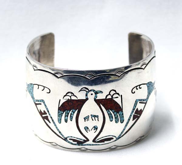Native American Navajo Bracelet by Gibson Gene: Native American Navajo Sterling and Chip Inlay Turquoise and Coral Bracelet by the late Gibson Gene, inside measures 7'' which includes opening x 1.75''W, 82.09g in total wt.