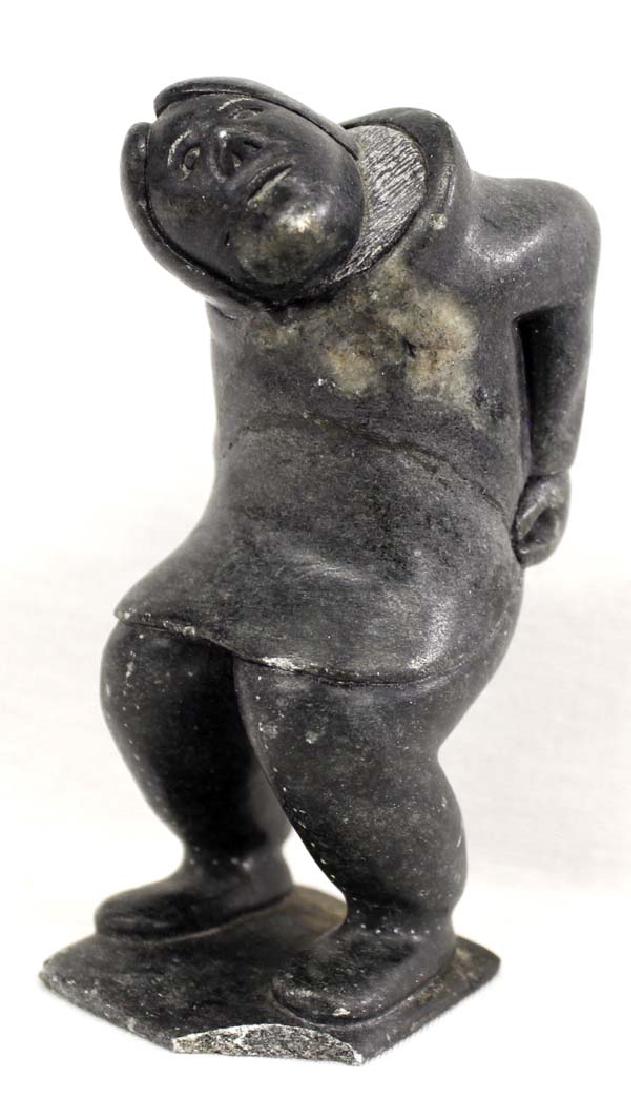 Native American Canadian Inuit Carved Stone Woman: Native American Canadian Inuit Carved Stone Woman Pulling up her Amauti, signed with disc number, measures 2.5'' x 6'' x 3''