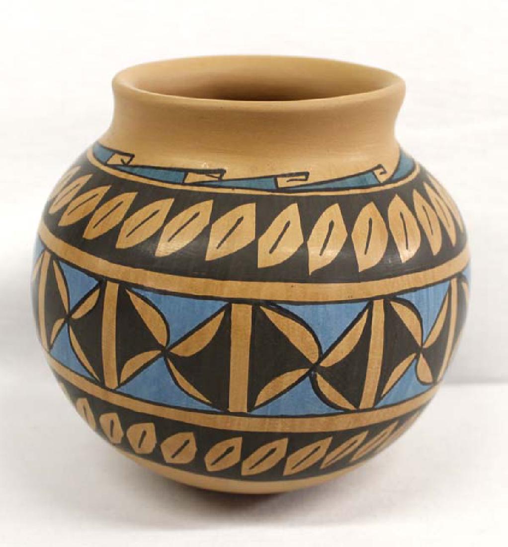 Mexican Mata Ortiz Polychrome Jar by A. Cota: Mexican Mata Ortiz Polychrome Jar by Alejandra Cota, measures 6'' x 6'' and is signed by artist, features blue, black, and brown pinwheel designs