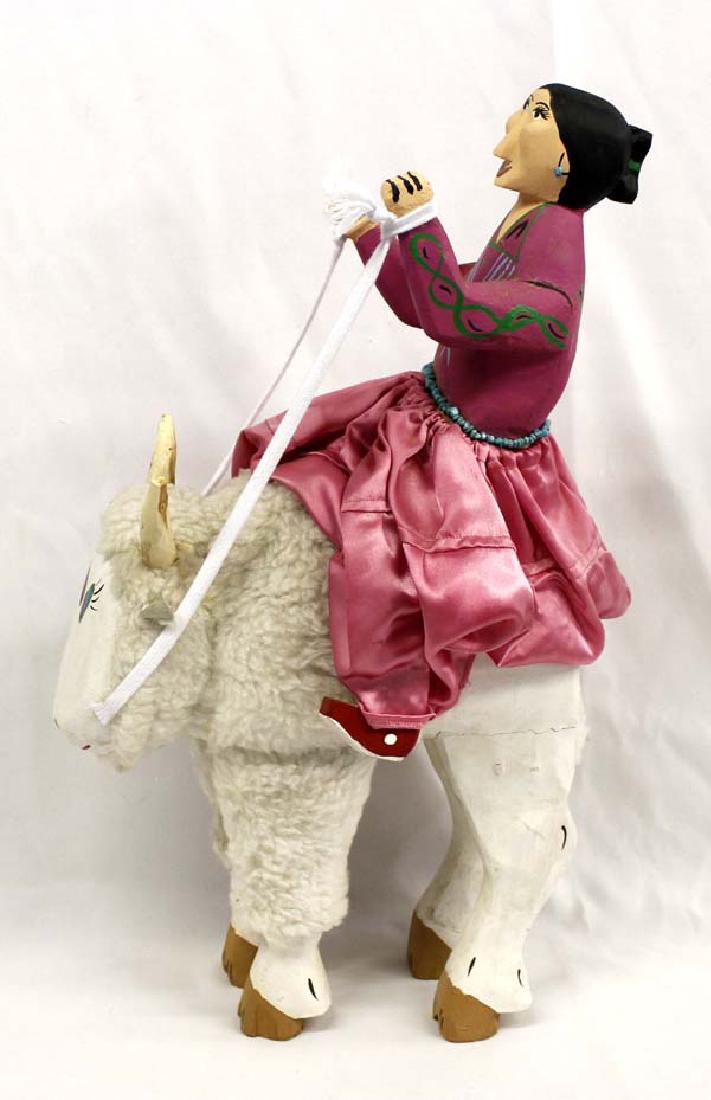 Whimsical Navajo Carved Wood Folk Art by D. Buck: Whimsical Native American Navajo Carved Wood Folk Art by Delbert Buck, measures 20.5'' x 11'' x 8'', features Navajo maiden in traditional painted pink Velvet top and actual satinized cloth skirt, wea
