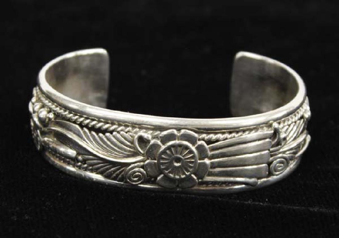 Navajo Sterling Silver Applique Cuff Bracelet: Beautiful Native American Navajo Sterling Silver Applique Cuff Bracelet, Hallmarked JD and stamped sterling, inside measures 6.5'' which includes opening x 5/8''W, very flattering on and weighs 42.86 