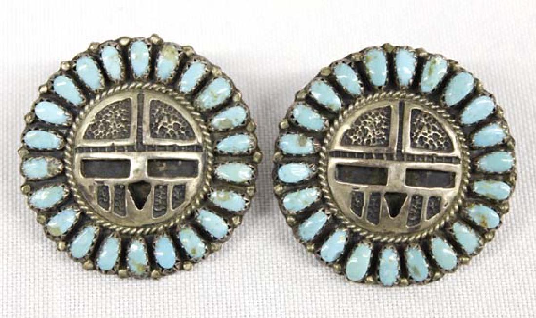 Navajo Sterling Turquoise Earrings by Lura M Begay: Native American Navajo Sterling Turquoise Sun God Earrings by Lura Moses Begay (LMB), stamped sterling and measure 1.25''D, beautiful turquoise and carved silver details