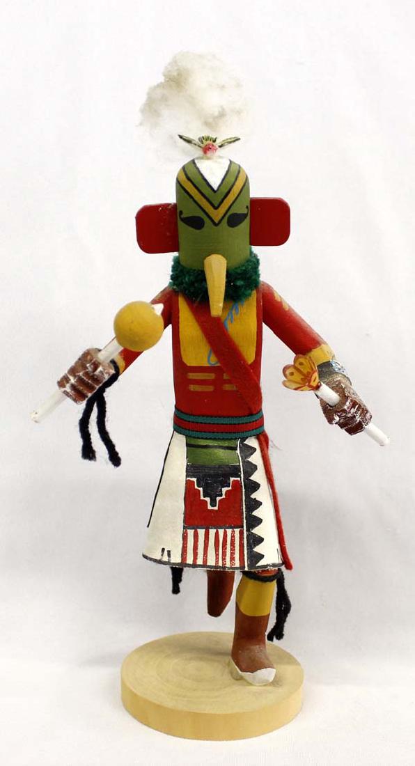 Navajo Hand Carved Parrot Kachina by V. George: Native American Navajo Hand Carved Parrot Kachina by V. George, signed by artist and measures 5'' x 11''H, embellished with feathers, yarn, rabbit fur, leather, beautiful colors
