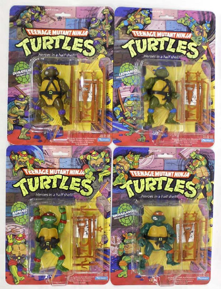 4 Teenage Mutant Ninja Turtle Action Figures (1 of 5)