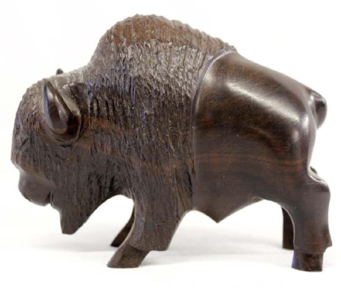 Carved Ironwood Buffalo: Hummert Estate Carved Ironwood Buffalo, measures 5''L x 4''L x 2''Deep