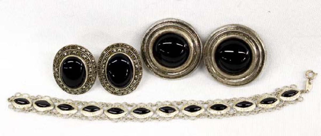 Collection of Sterling and Onyx Jewelry: Collection of Sterling and Onyx Jewelry, #1 Vintage Mexican Sterling Silver Onyx Clip-On Earrings, hallmarked #2 Vintage Sterling Marcasite Leverback Earrings, hallmarked #3 Sterling Silver Onyx Filig