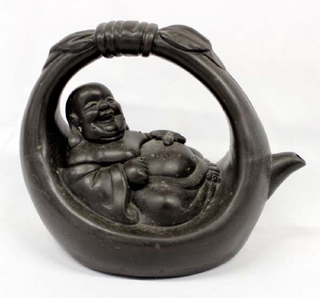 Chinese Yixing Clay Buddha Teapot: Hummert Estate: Chinese Yixing Clay Buddha Teapot, ''carfted of purple clay and renowned as the best vessels for brewing by Chinese tea aficionados.'' measures 6.75''H x 8.5''W, holds 26 oz.