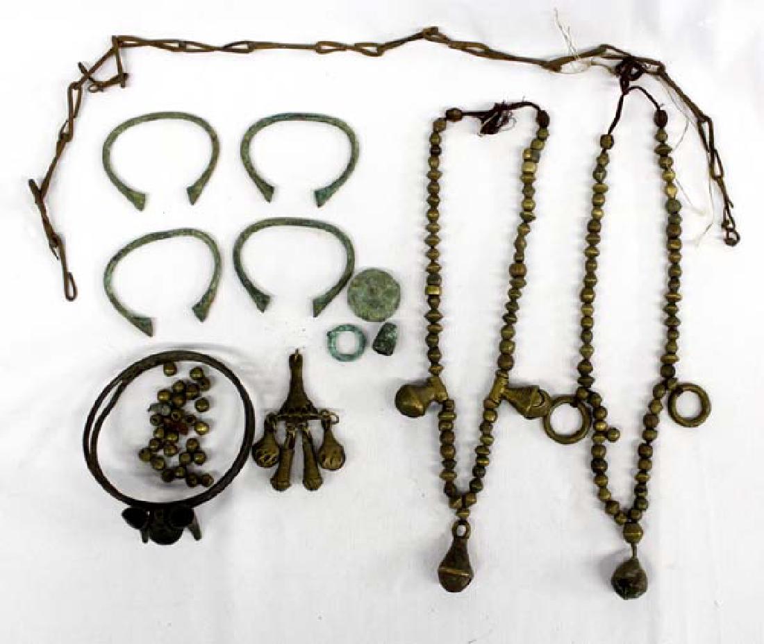 African Tribal Bracelet and Collection of Findings: African Tribal Arm Bracelet and Collection of Findings, 12.5'' inside measurement of bracelet, includes 2 brass bell necklaces, wrist cuff bracelets, brass beads, brass amulet, and other pieces
