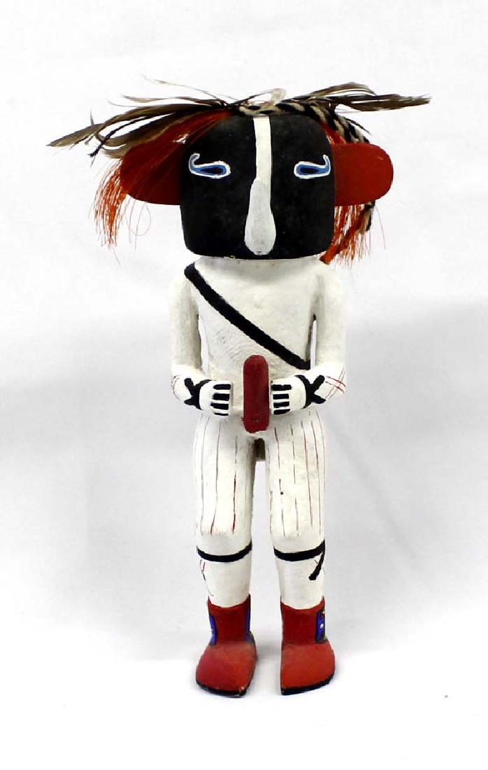 Estate Hopi Carved Wood Kokopelli Kachina: Hummert Estate: Native American Hopi Carved Wood Kokopelli Kachina, he's one happy guy measuring 10.5''H x 6''W x 3''Deep and rather well endowed, hand painted and embellished with feathers and nylon 
