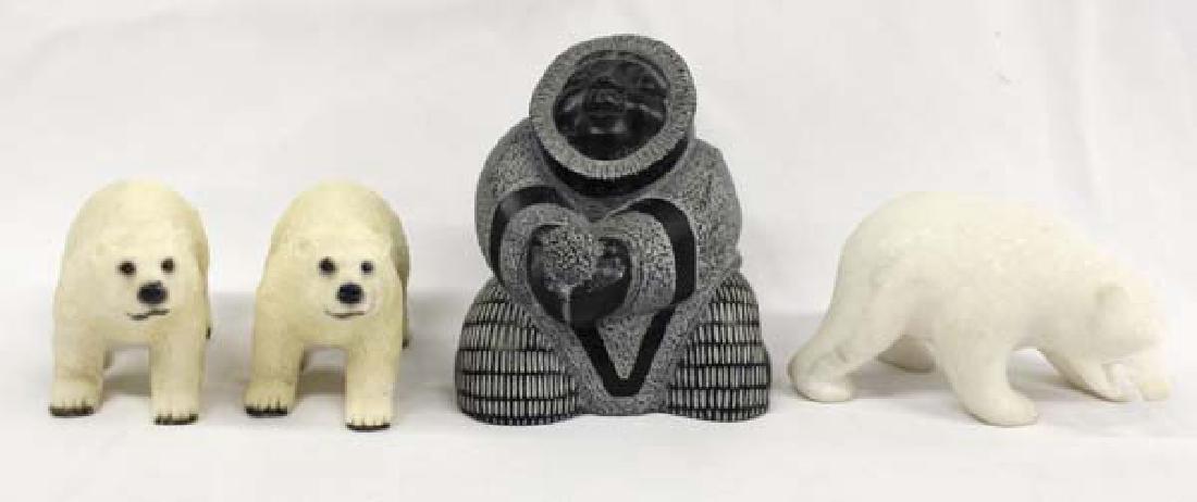 3 Polar Bear Figurines and 1 Eskimo Figure: 3 Polar Bear Figurines and 1 Eskimo Figure, largest measures 4'' x 4'', one of the polar bears is stone
