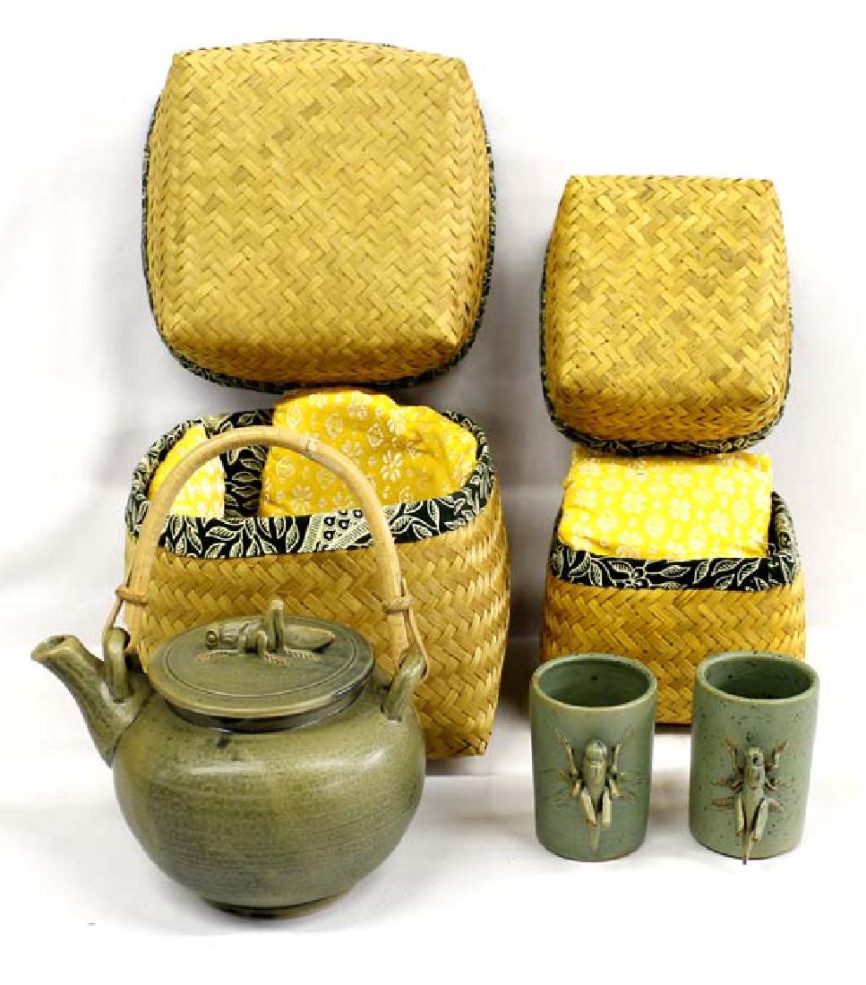 Balinese Grasshopper Teapot with Matching Cups: Hummert Estate: Balinese Grasshopper Teapot with Matching Cups, both cups and teapot come in wicker baskets, teapot measures 5'' x 7.5''