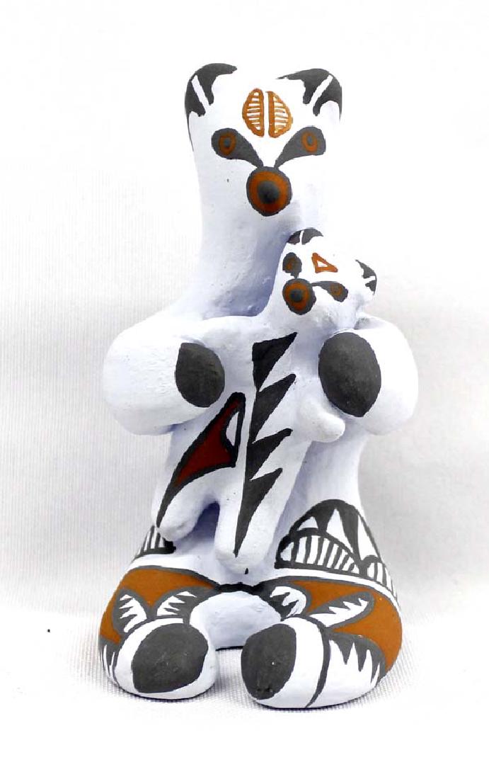 Jemez Pottery Bear Storyteller by Mary Small: Native American Jemez Pottery Bear Storyteller by Mary Small, measures 2.5'' x 4'' x 2'' and is signed by the artist, FYI: ''From the age of 8, Mary helped her mother make pottery and weave yucca bask