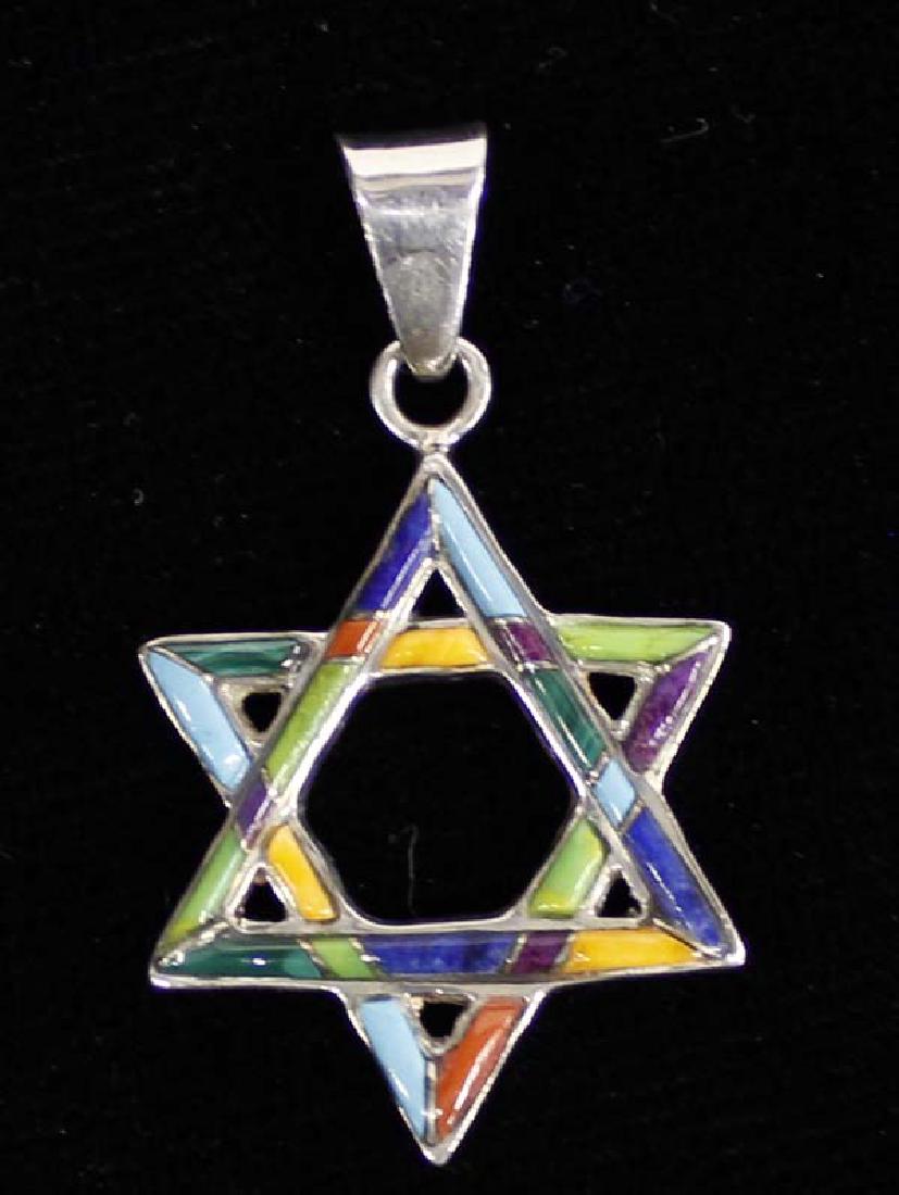 Sterling Silver Inlay Star of David Pendant: Sterling Silver Inlay Star of David Pendant, measures 1.75''L x 7/8''W, stamped sterling and hallmarked, inlay includes turquoise, orange shell, gaspeite, red shell, and sugilite