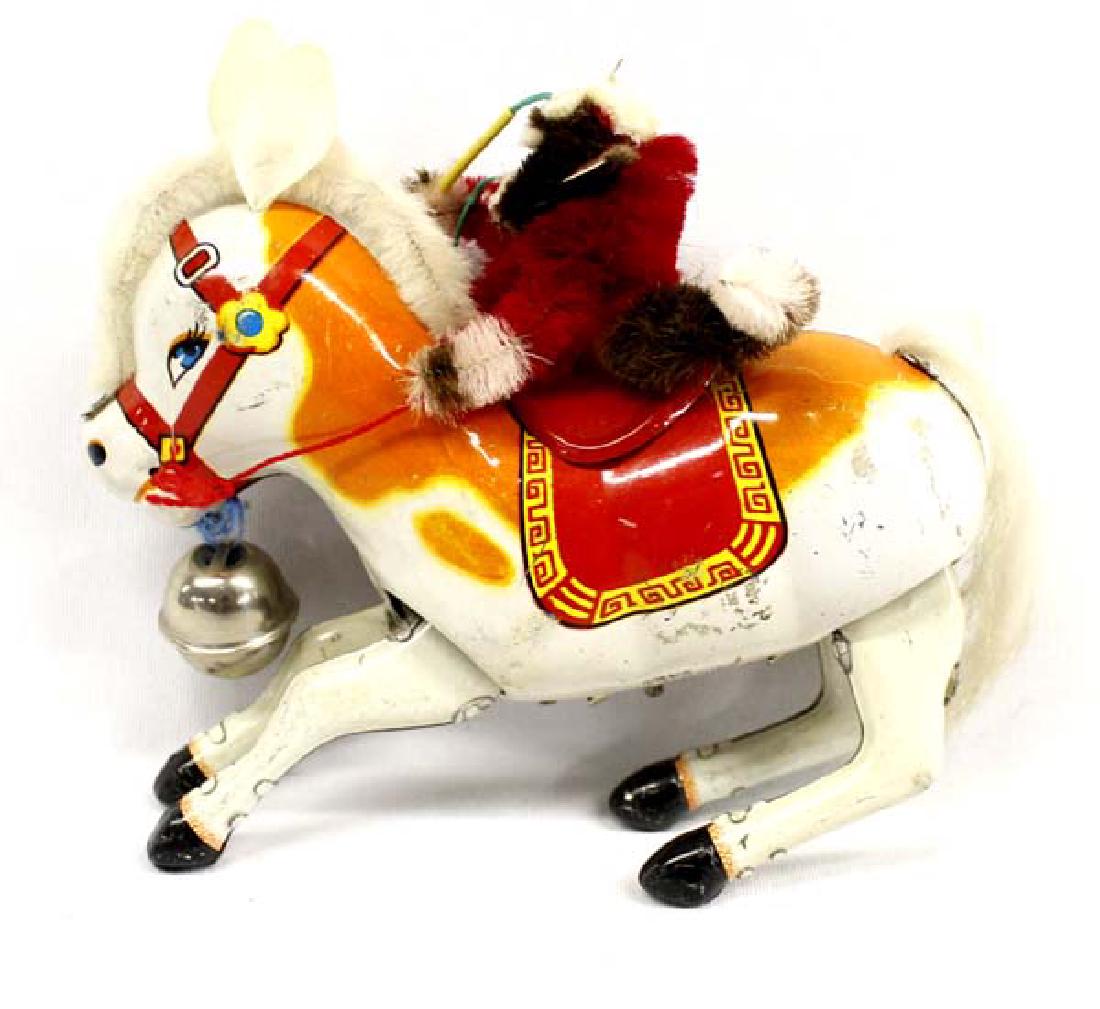 Vintage MS764 Tin Litho Wind Up Monkey & Horse Toy: Vintage MS 764 Tin Litho Wind Up Monkey Riding Horse, made in China, comes with key and does work, measures 5'' x 6''