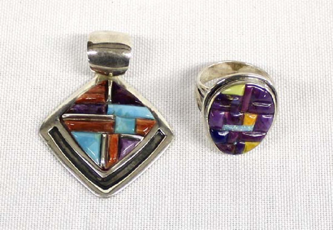 Sterling and Multi-Stone Ring and Pendant: Sterling and Multi-Stone Ring and Pendant, ring is a size 6 and measures 7/8''L x .75''W and includes sugilite, turquoise, red shell, opal, and jet, the pendant measures 1.75''L x 1.25''W, has a large