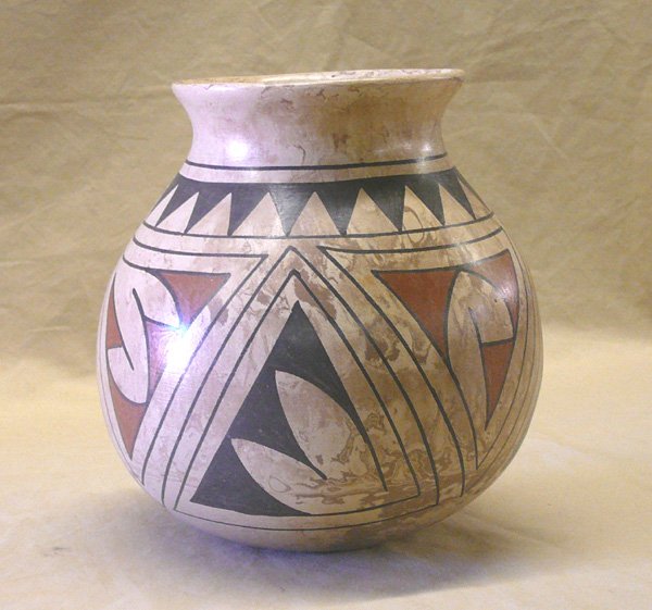 Mata Ortiz Marbleized Jar by Luis Ortiz 7x7": Mata Ortiz Marbleized Polychrome Jar by Luis Ortiz. 7''x7''. SHI $30.