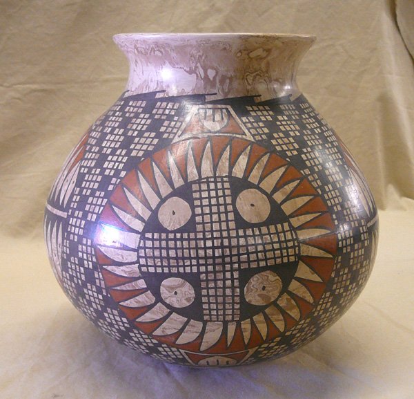 Mata Ortiz Large Jar by Luis Ortiz 8 x 8": Mata Ortiz Large Marbleized Jar by Luis Ortiz. 8''x8''. SHI $35.
