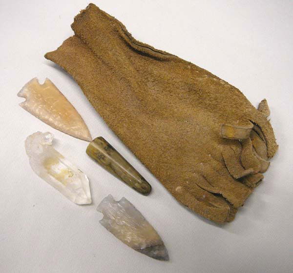 5 Native American Treasures & Leather Pouch: 5 Native American Treasures including, Leather Pouch, 2 stone points, 1 crystal, and 1" oblong stone awl. Bag measures 6''x2.5'' SHI $15.
