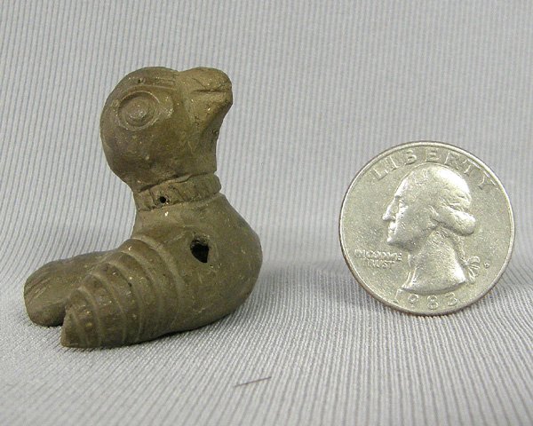 Pre-Columbian Miniature Clay Bird Whistle 1.75''W: Pre-Columbian Small Pottery Bird Whistle 1.75'' Wide Wingspan. Tip of one wing is broken. SHI $20.