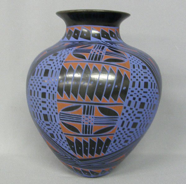 Mata Ortiz Olla By Rosa Gaona 8'' x 7'': Mata Ortiz Olla By Rosa Gaona 8'' x 7''. Red and blue on black. SHI $25.