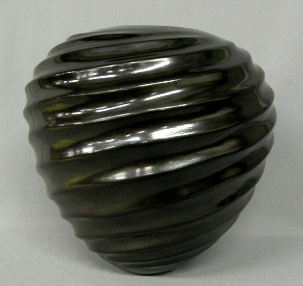 Mata Ortiz Pottery By Alonso Sandoval 11'' x 10'': Mata Ortiz Pottery By Alonso Sandoval 11'' x 10''. Swirl design, highly burnished Black. SHI $35.