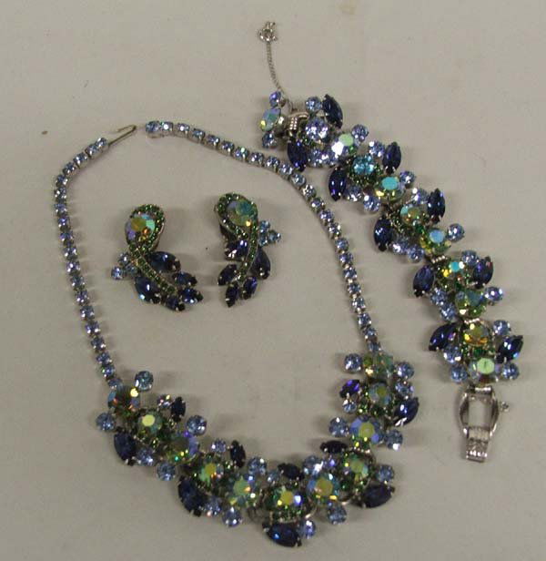 Vintage Estate Rhinestone Necklace 3pc Set: 1950's Purple Irridescent Rhinestone Set includes: Necklace Choker, 16'' , Bracelet 7.5'' & Earrings 1 3/4'' clip on. SHI $15.