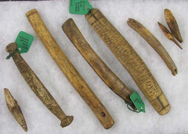 Eskimo Bone Artifact Carved Handles & Tools : Collection Of 8 Bone Tools, largest 7''. Bucket, Pail, Canoe Handles plus utilitarian tools, including large eyed sewing needle. SHI $20.